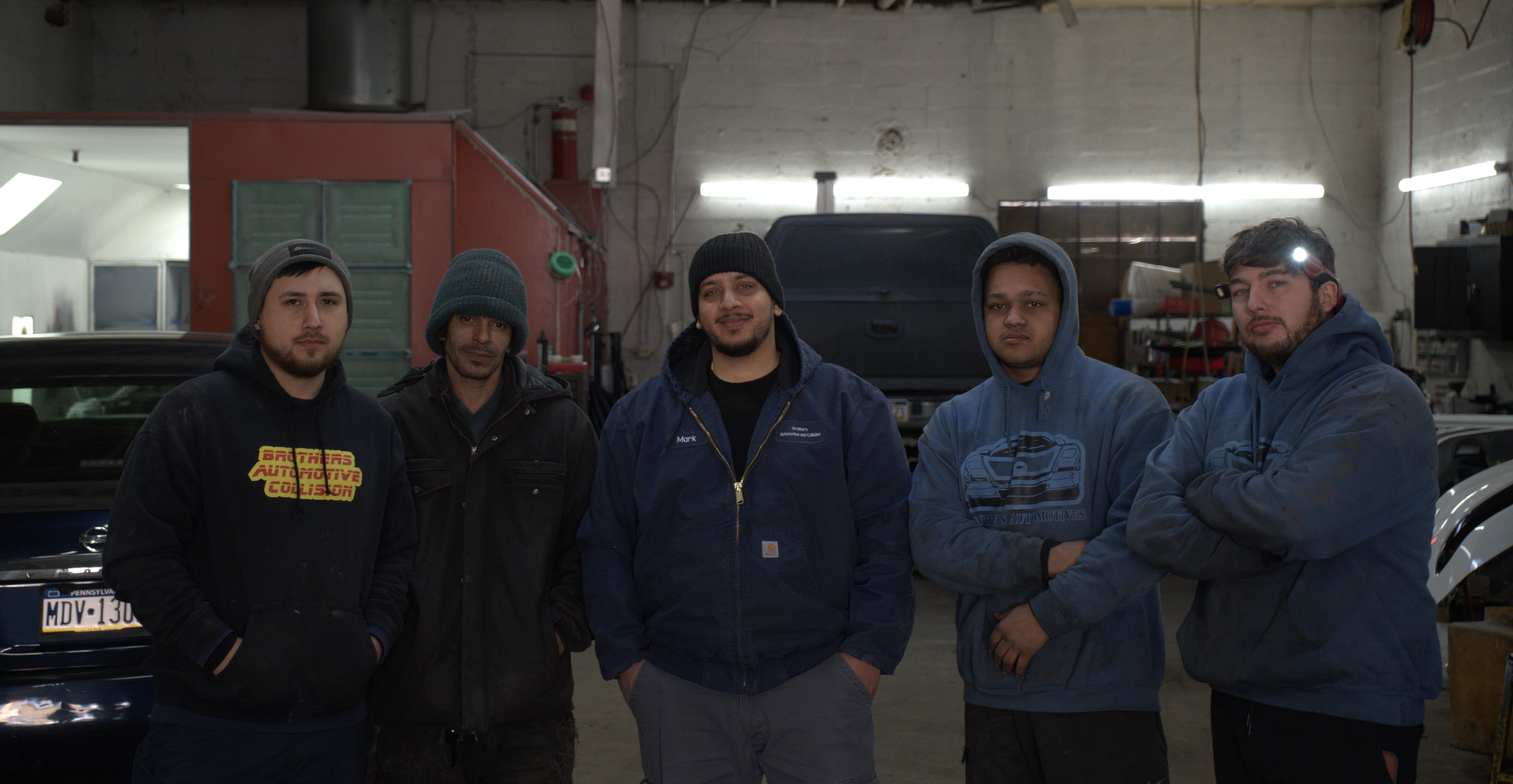 Brothers Auto Team in Garage